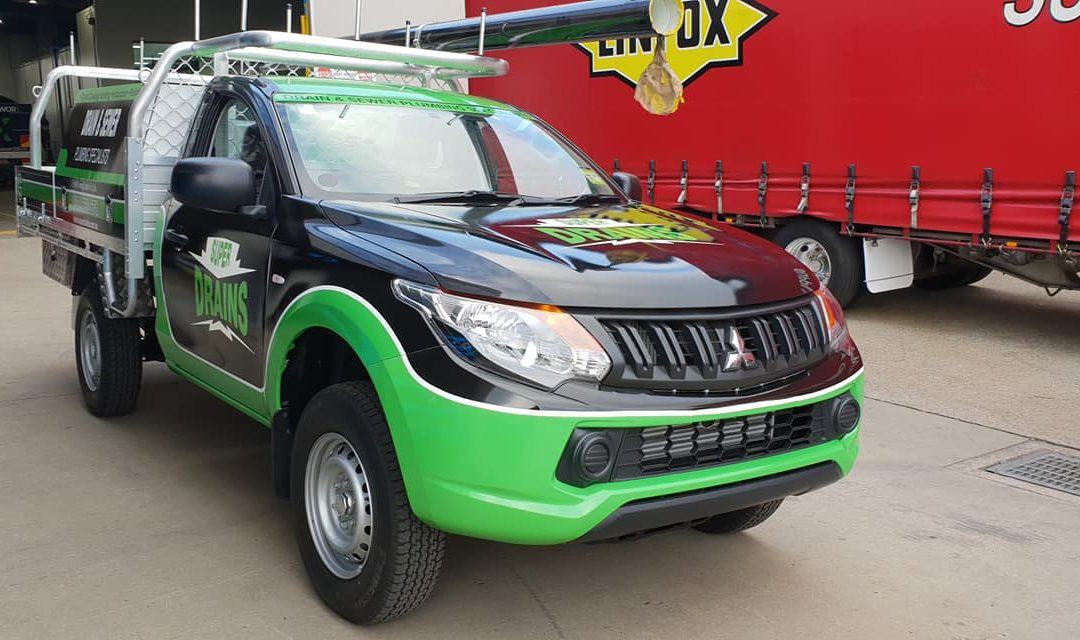 ute with graphics design - vehicle wraps Albury-Wodonga