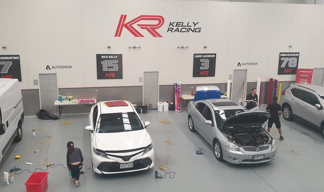 Kelly Racing garage with logo printed on wall