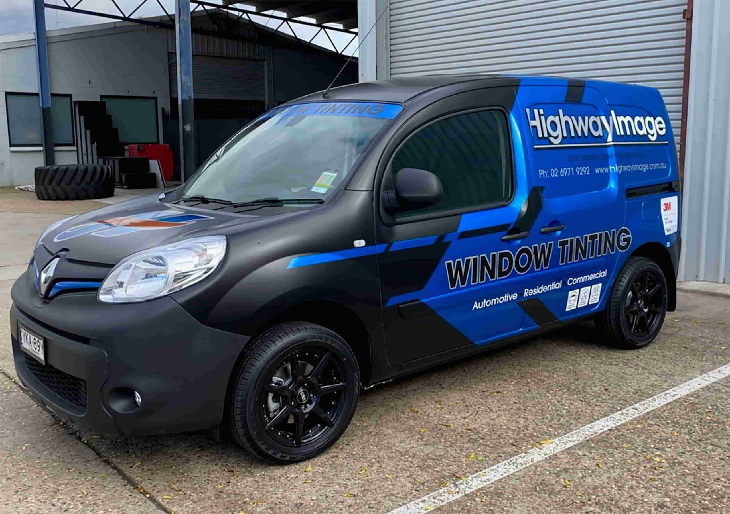 Wrapped Black and Blue Van